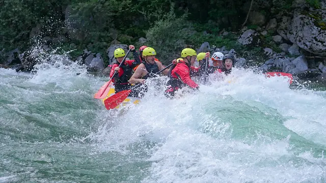 Rafting group surrounded by whitewater on the Soča River